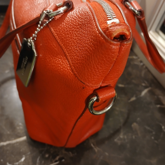 Coach Tyler Tote in an orange/red shade of pebbled leather. - Picture 7 of 16